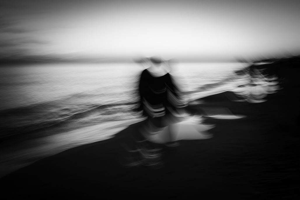 "Fading" - a black and white photo with motion blur by Alicia Bergeron
